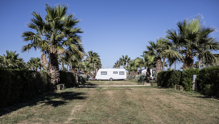 white caravan in a campingの写真素材