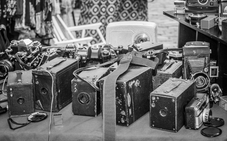 Old photo camera in a marketの写真素材