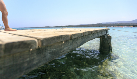 Wooden pier on the mediterranean seaの写真素材