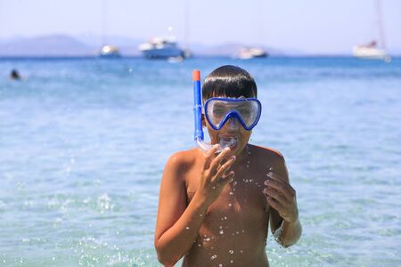 Boy with snorkeling maskの写真素材