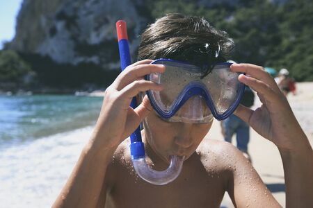 Boy with snorkeling maskの写真素材