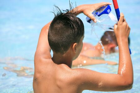 Boy with snorkeling maskの写真素材