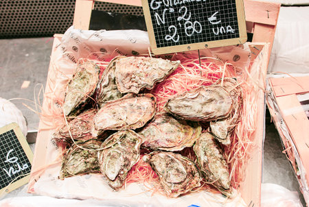Fresh oysters in a food market of Barcelonaのeditorial素材