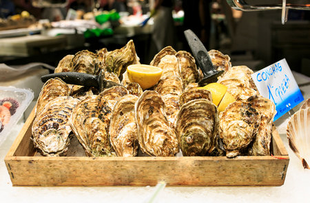 Fresh oysters in a food market of Barcelonaのeditorial素材