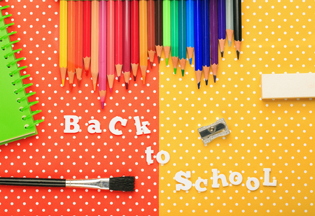 Scholar material to back to school in colored background