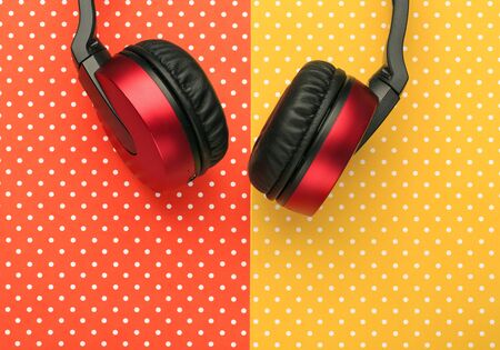 Earphones with colorful topped backgroundの写真素材