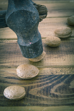 Group of almonds in a wooden tableの写真素材