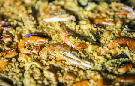 typical paella with seafood and riceの写真素材