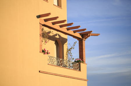 Yellow balcony with plants in Spainの写真素材