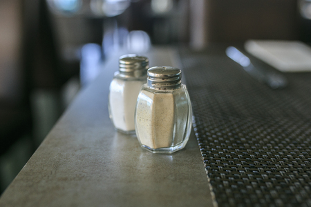 Salt over a wooden tableの写真素材