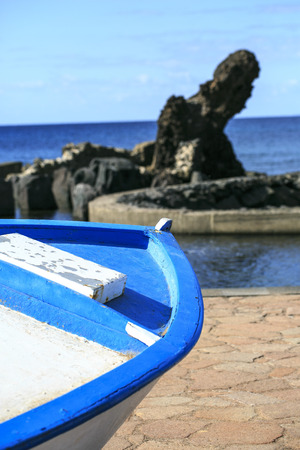 Old vintage boat out of the waterの写真素材