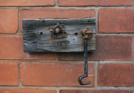 old and dirty door padlockの写真素材