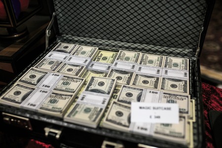 Fake group of dollar banknotes suitcaseの写真素材