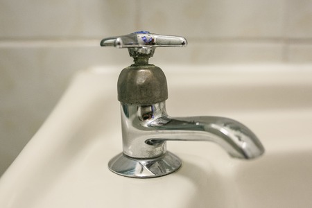 Faucet ina bathroomの写真素材
