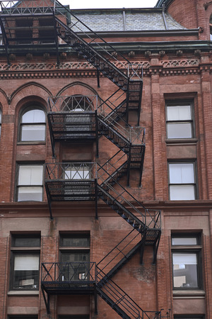 Stairs in a brick buildingの写真素材