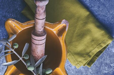 Yellow mortar to make a sauce called allioli, typical of Catalonia. Spainの写真素材