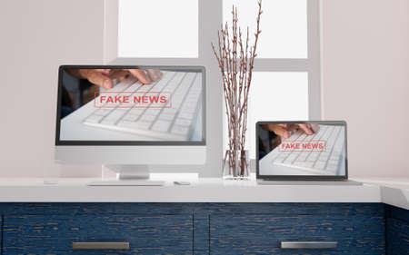 Workspace at home with a desktop computer 3d rendering Fake news mockup.Modern Web responsive concept . 3d illustrationの写真素材