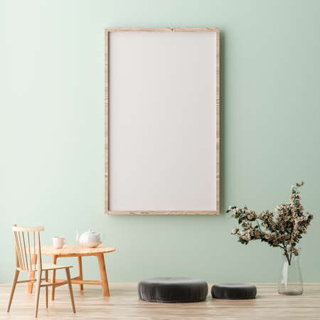 Blank vertical poster frame mock up standing on green wall. One wooden frame isolated in Scandinavian interior. 3d renderingの写真素材