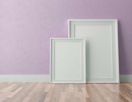 Three vertical white frame mockup, golden frame on black wall, 3d illustrationの写真素材