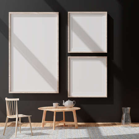 Three vertical white frame mockup, golden frame on black wall, 3d illustrationの写真素材