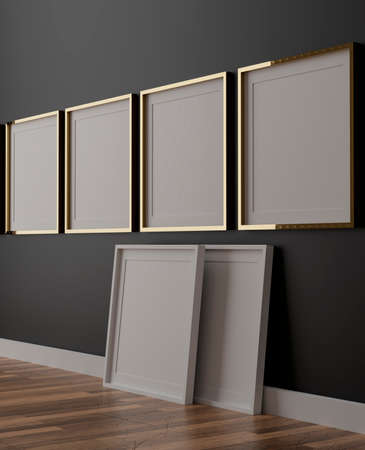 Four vertical white frame mockup, golden frame on black wall, 3d illustrationの写真素材