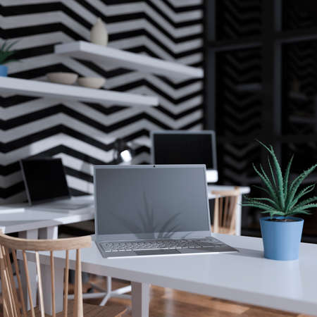 Desktop computer on the table of the office mockup 3d rendering. 3d illustration. Night sceneの写真素材