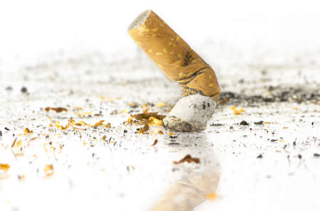 Close up of a consumed cigarette in an ashtrayの写真素材