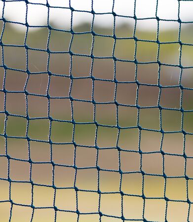 Green net over a blurred background