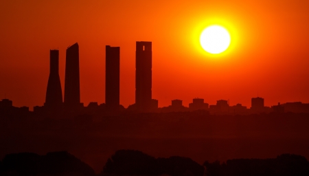 Sunrise business tower silhouette in Madridの写真素材