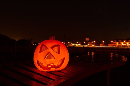 Halloween pumpkin Jack O'Lantern at nightの写真素材