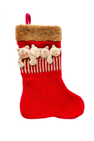 Red Christmas sock isolated on a white backgroundの写真素材