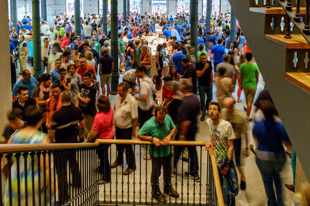 MADRID, SPAIN - JUNE 21 - People inside and outside the Apple store  New Apple Retail Store Opening in Sol square, in Madrid, Spain, on June 21, 2014のeditorial素材
