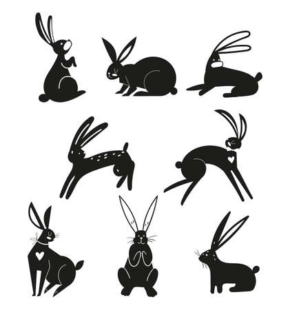 Silhouettes of black rabbits isolated on a white background. Easter bunnies in vector style. Silhouettes of animals. Set of hares.のイラスト素材
