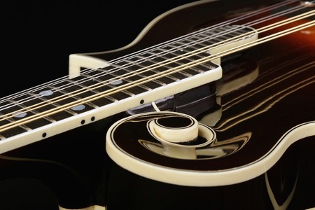 Mandolin era isolated on black backgroundの写真素材