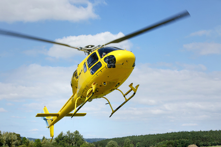Helicopter rescue, helicopter in the air while flying. 