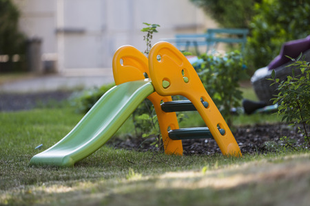 Children slides in the gardenの写真素材