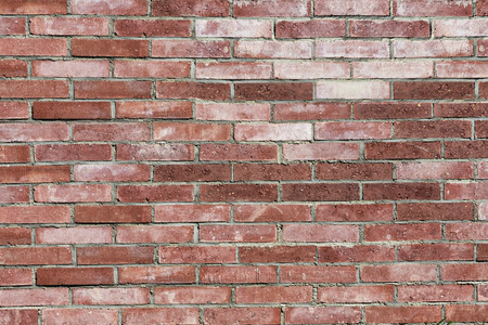 Red brick wall background, old brick wall inlaid regularly