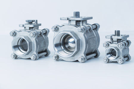 Group 3 valves, different sizes, ball valve with selective focus on thread fittingsの写真素材