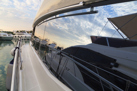 View of the magnificent colorful sunset at the harbor, where luxury yachts parked in Sukosan near Zadar, Croatiaの写真素材