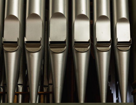 part of the church organ with many air pipes made of metal, detailの写真素材