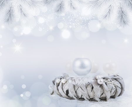 Silver advent wreath with 4 metallic candles on blue backroundの写真素材