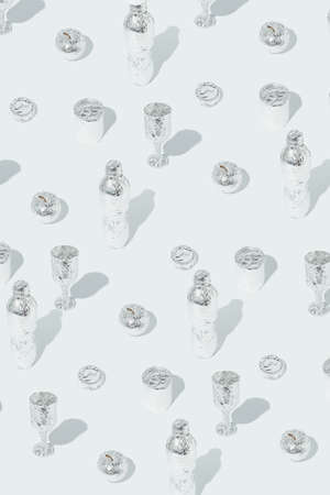 Creative and unique  still life pattern. Food and drink in aluminium foil. Space travel and food...