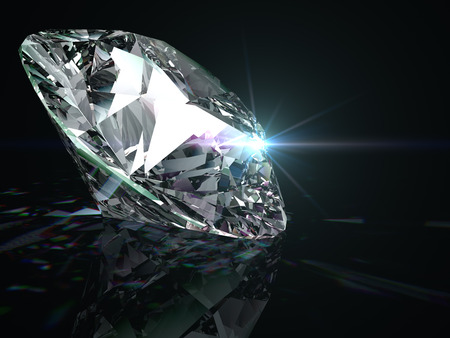 Shiny diamond on black background.の写真素材