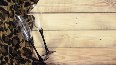 Wine glass for wine on a wooden background.の写真素材