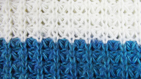 Beautiful blue and white knitted background.の写真素材