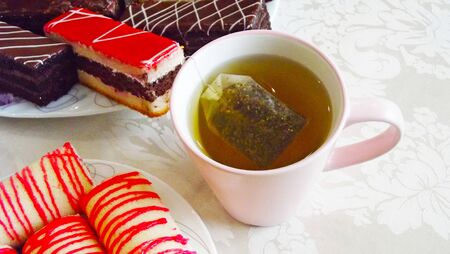 Fragrant fresh tea with sweets.の写真素材