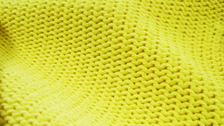 Beautiful yellow knitted background.の写真素材