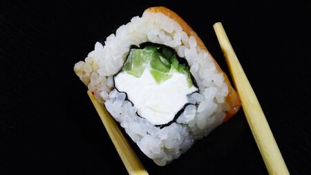 Tasty rolls on a black background.の写真素材