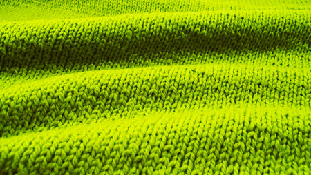 Beautiful green knitted background.