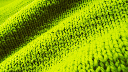 Beautiful green knitted background.
